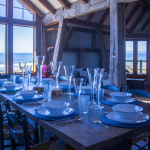 corelle dinnerware on a table in a coastal dining room